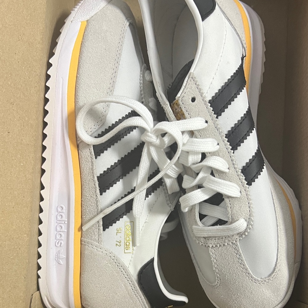 Adidas White and Black Sneakers with Yellow Accents